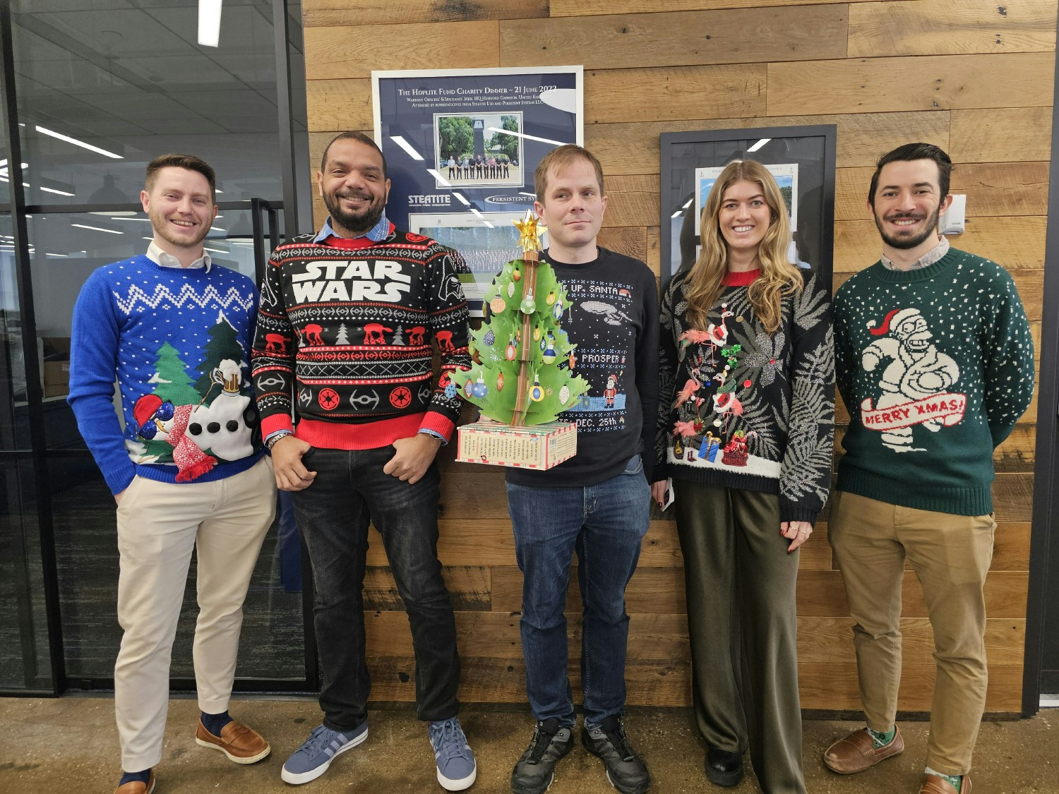 Our team showing off their best looks at our annual Ugly Sweater Day