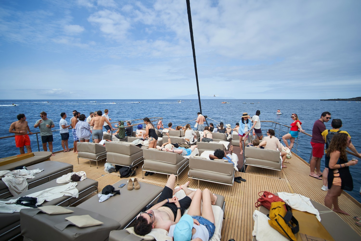 Expensify employees taking in the sun during Offshore 2022 in Tenerife