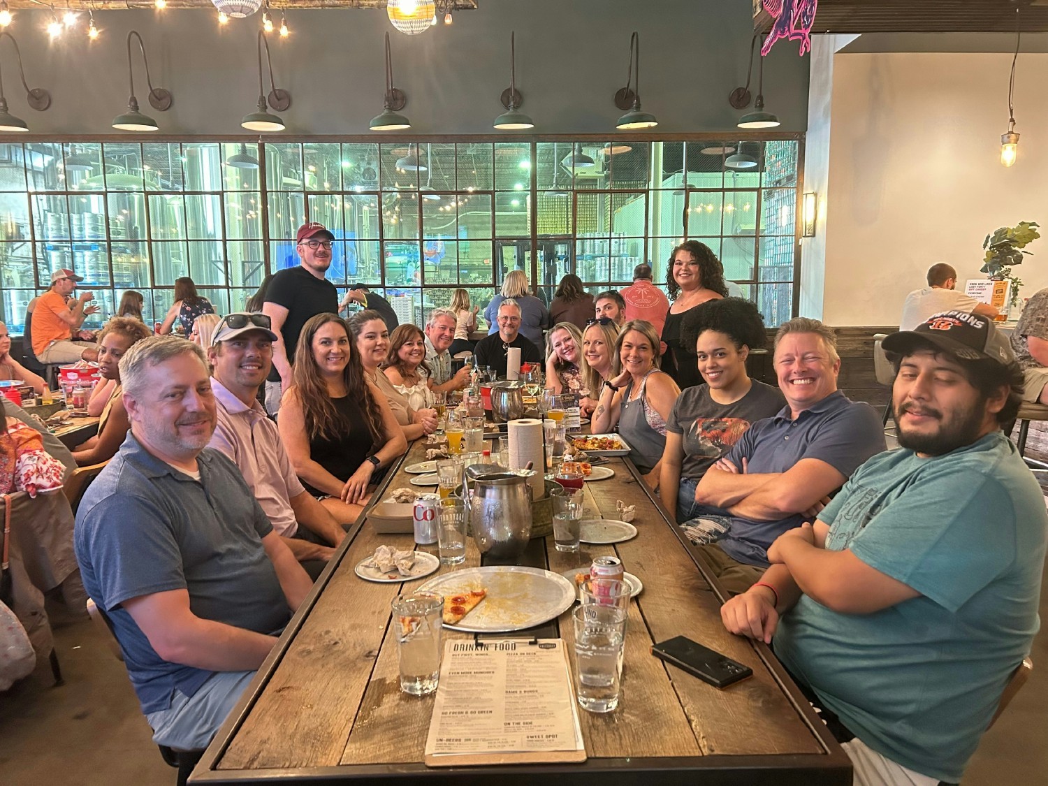 A team of Insighters gather in Arkansas at a local brewery for some team building