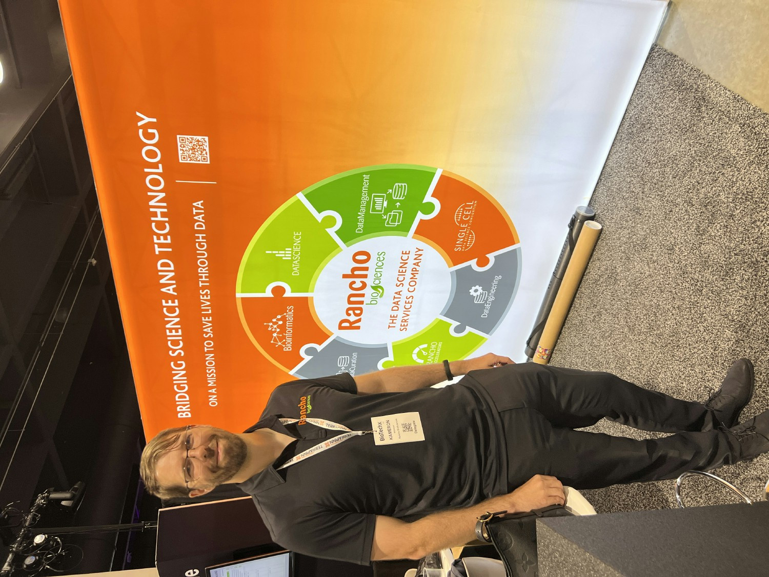 Employee at Annual BioTechx Conference Booth