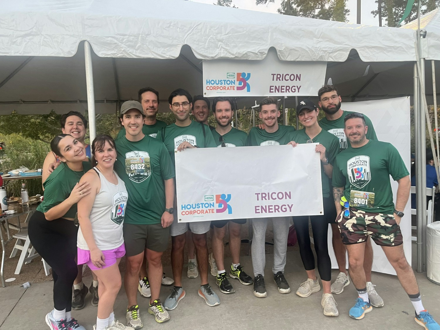Part of Team Tricon celebrates at the finish line of Houston’s largest corporate 5k event.