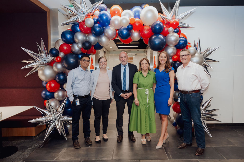 Tricon leaders cut the ribbon on the company’s new, LEED-certified headquarters office.