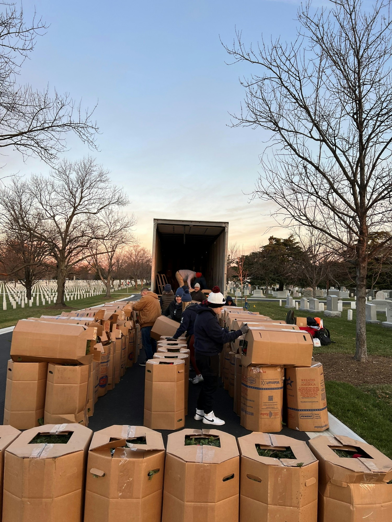 TekSynap employees helping out at Wreaths Across America, 2024.