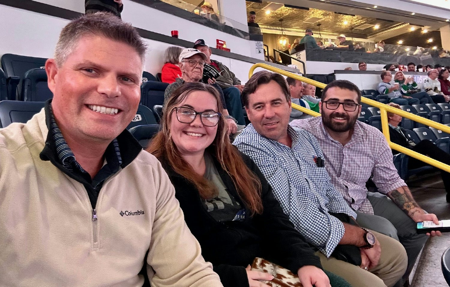 Preconstruction Team enjoying a hockey game!