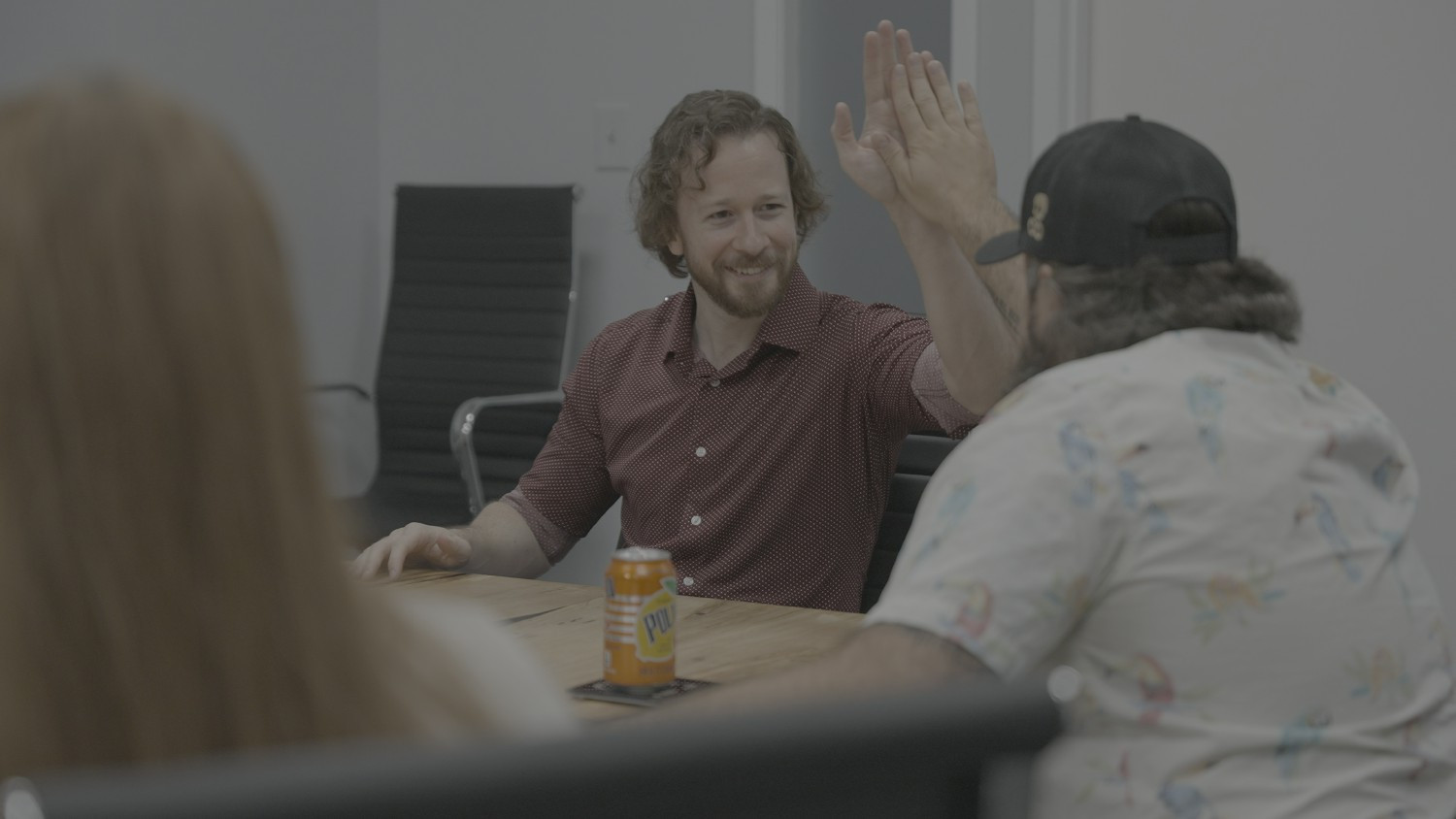 Dr. Thompson high-fiving iLabs Co-Founder Jason as they reminisce about the Guinness factory tour in Dublin, Ireland. 