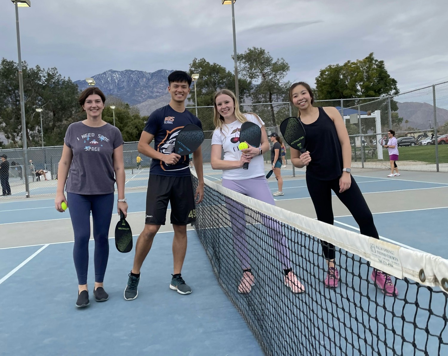 The CodeSignal team bonds over a game of Tennis during our 2022 Americas Meetup.
