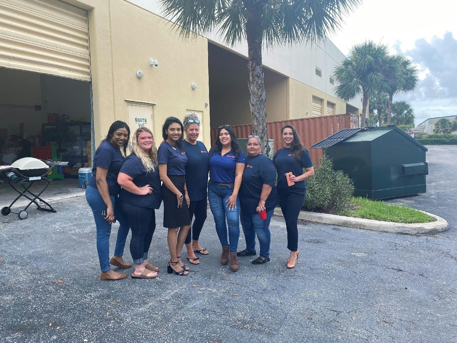 A handful of our ladies at a BBQ we hosted out back our office.