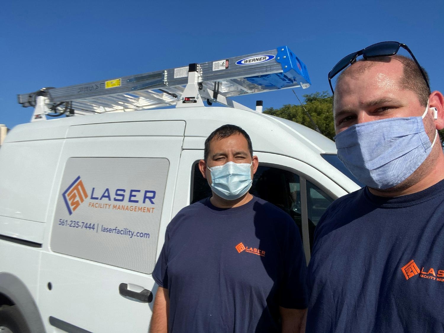 CEO with a technician in the field