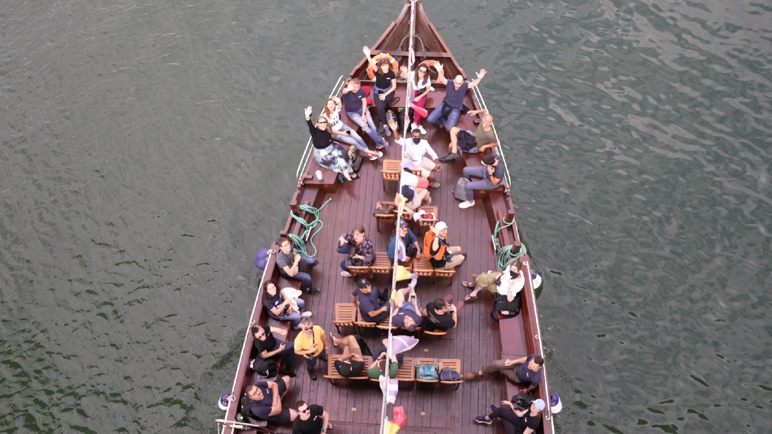 Arial view of XWP Team enjoying a river boat cruise on team day in Porto, Portugal.