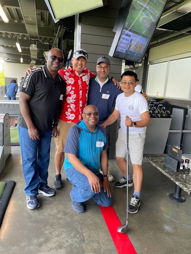 A few employees enjoying our Spring Fling at Top Golf  