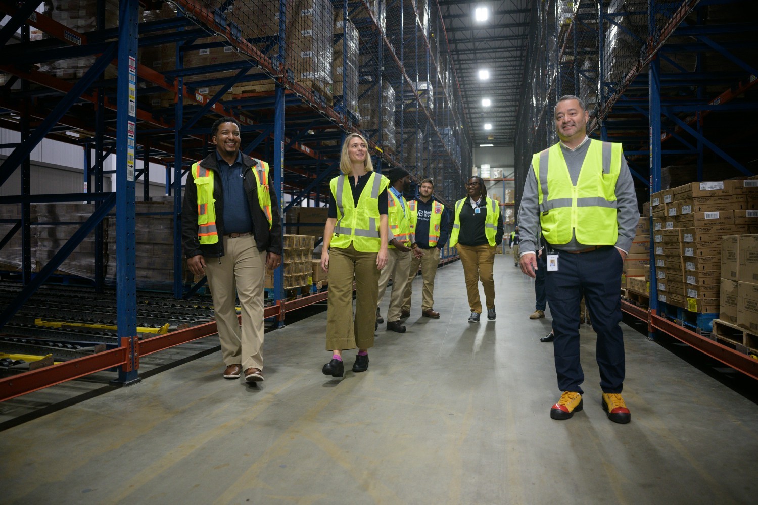  Sarah, our CEO walking through one of our 27 distribution centers with distribution team members.