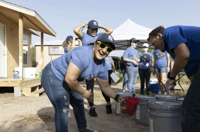 Annual Build Hope event where team members come together to participate in a home build for a family in need. 