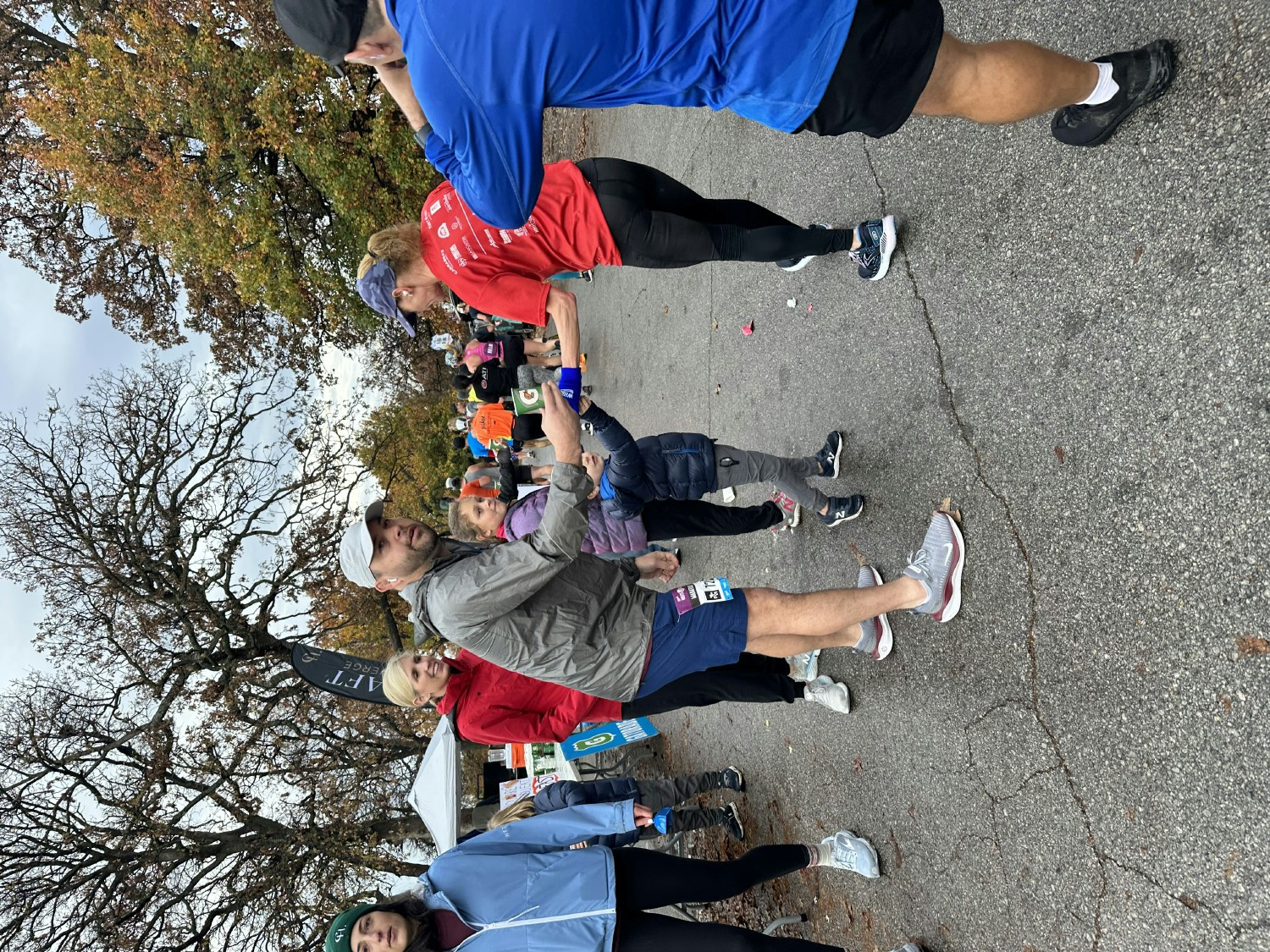 Founder and President, Trey Marler handing fellow racers water during the Route 66 Marathon in Tulsa, Oklahoma. 
