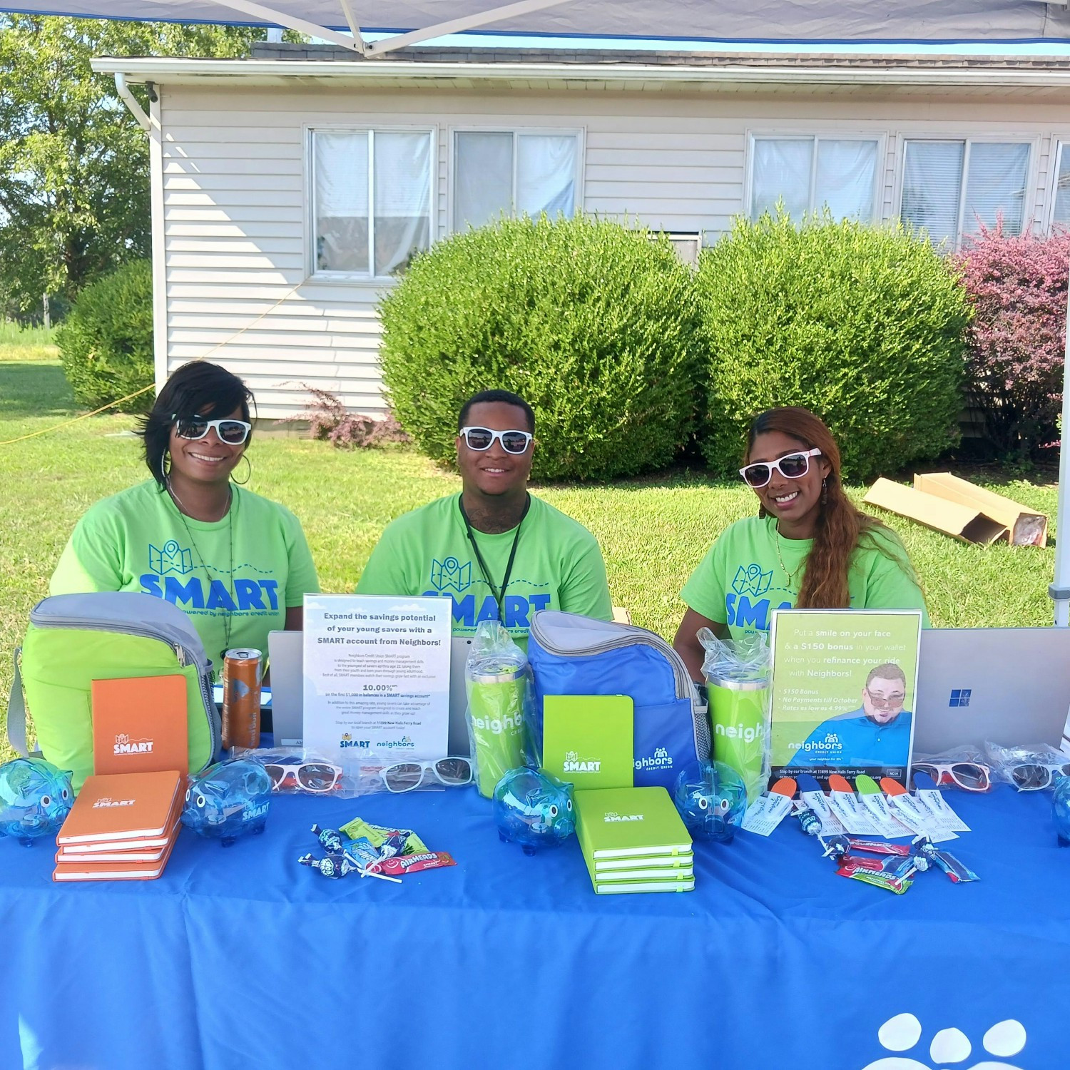 Neighbors out in the community helping people open accounts and improve their financial literacy...while looking cool. 