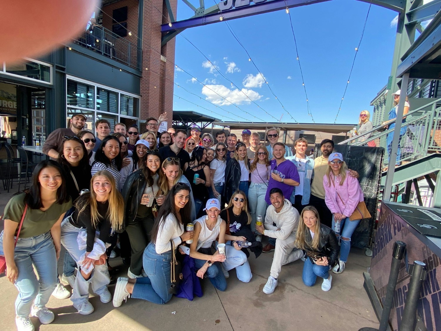 RevelOne Team at the Denver offsite retreat, attending a Colorado Rockies Baseball Game!