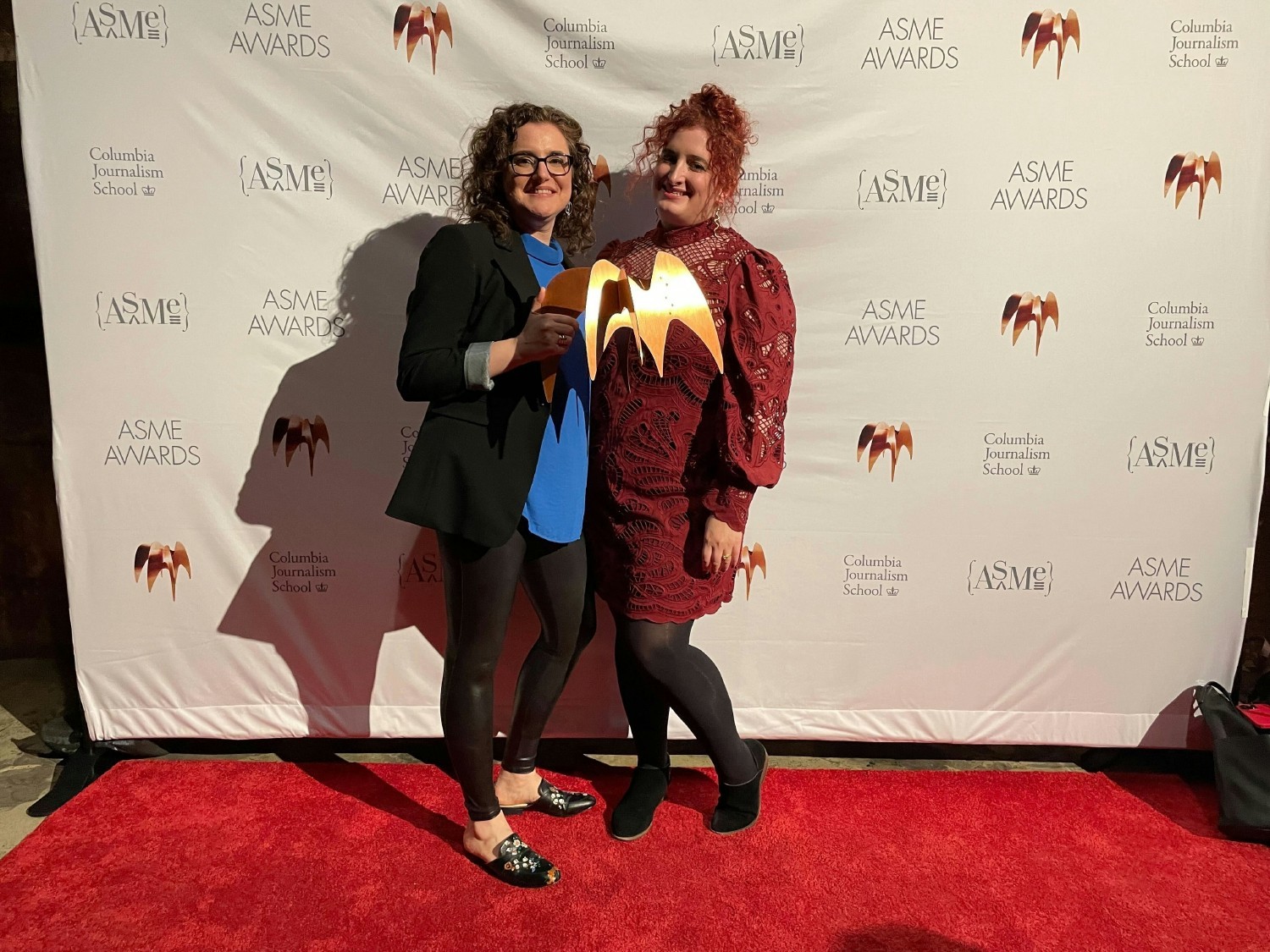 PopSci's Corinne Iozzio and Rachel Feltman after winning 