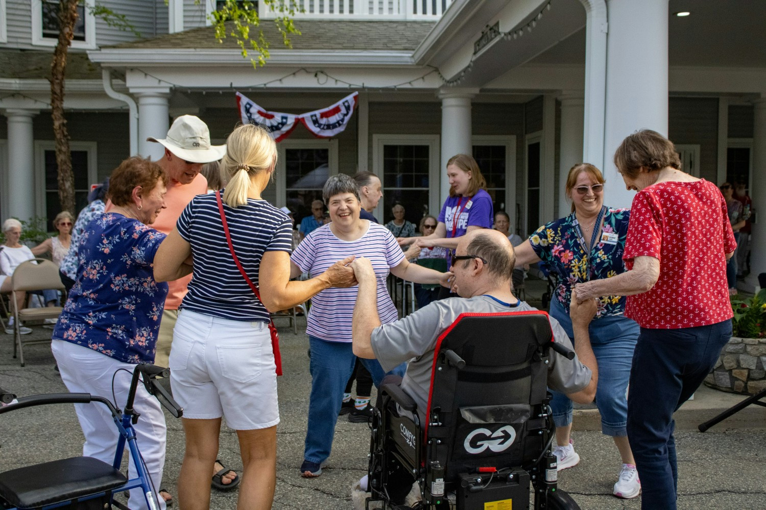 Senior Living Residences' team works to bring joy and adventure to every resident through singing and dancing together.