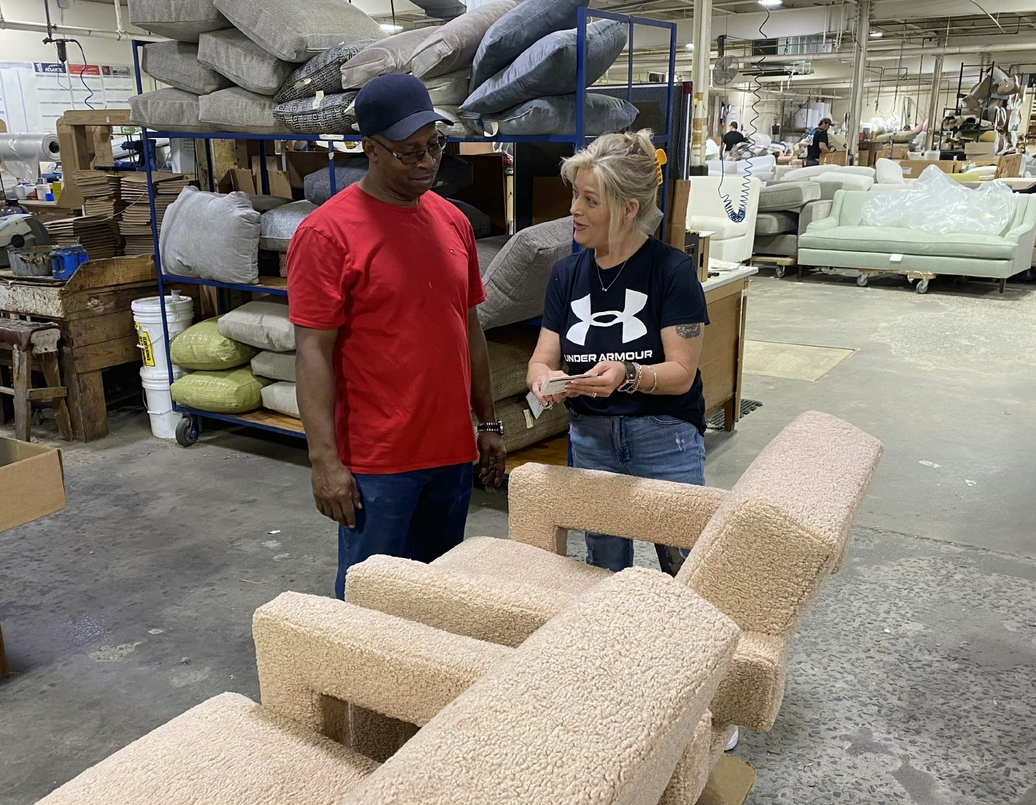 Members of the Tomlinson team working together with care and passion to make beautiful furniture pieces.