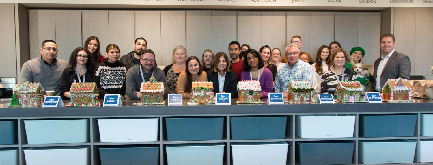The Kravet Marketing team building more than just gingerbread houses, building lasting memories and teamwork!
