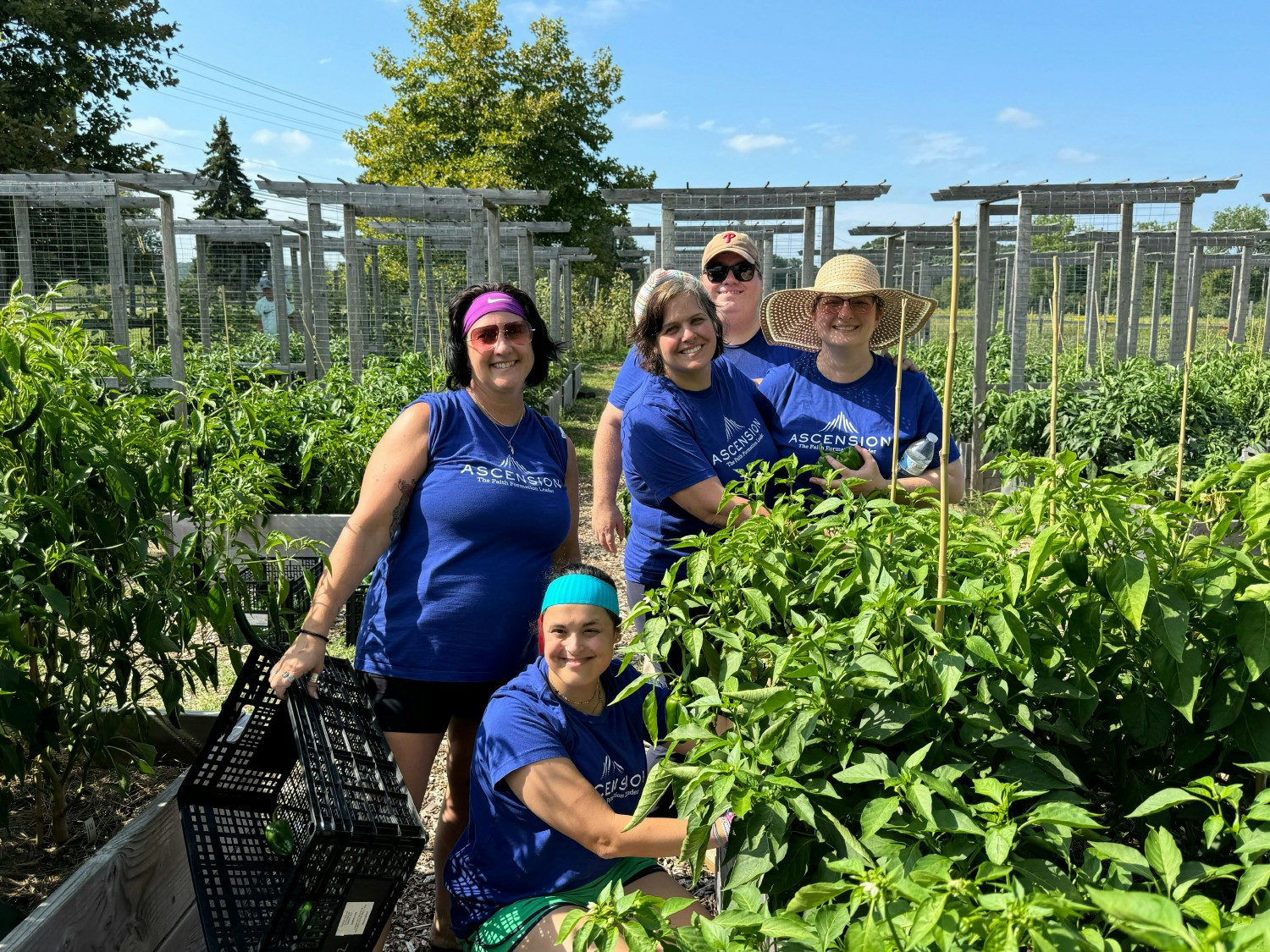 Ascension team members volunteering at Martha's Community Farm in Norristown, PA.