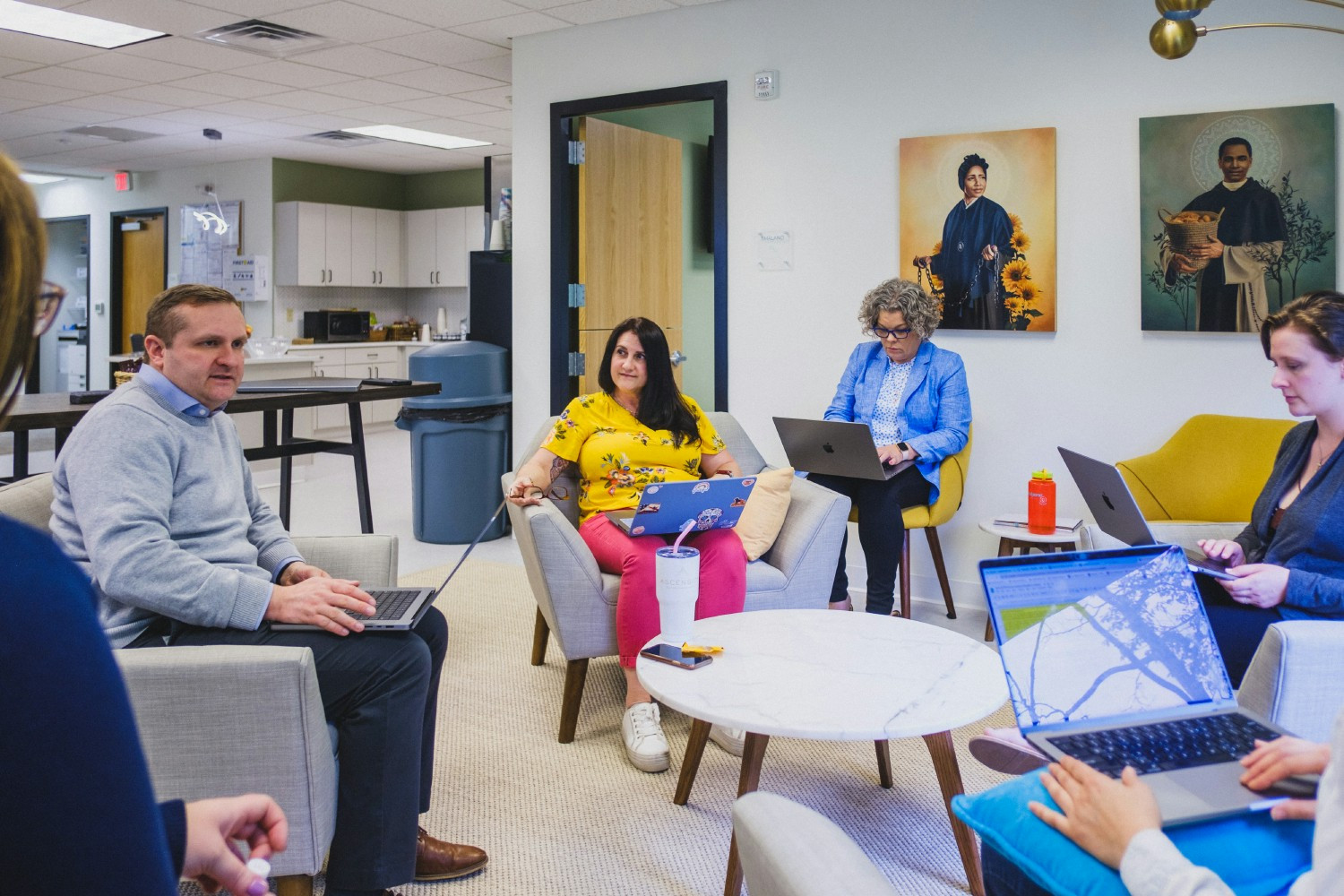 Ascension team members engaging in a brainstorming session with our CEO, President, and Owner, Jonathan Strate.