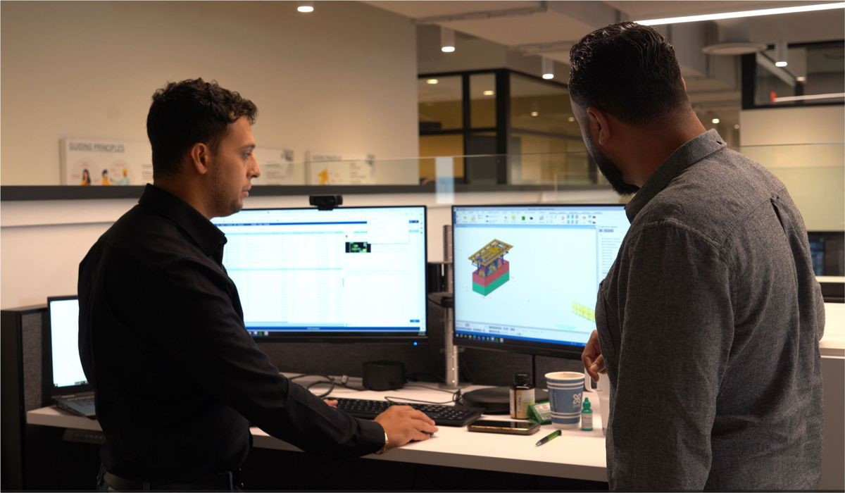 Team members collaborating on a design project