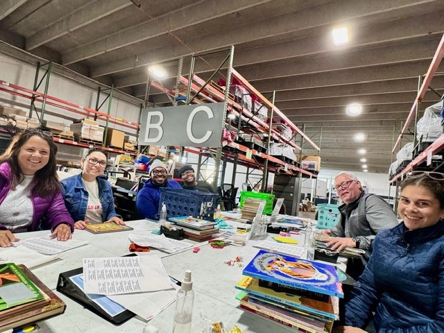 National Service Week- A group in Raliegh volunteering for Promising Pages. Each region had an opportunity to volunteer!