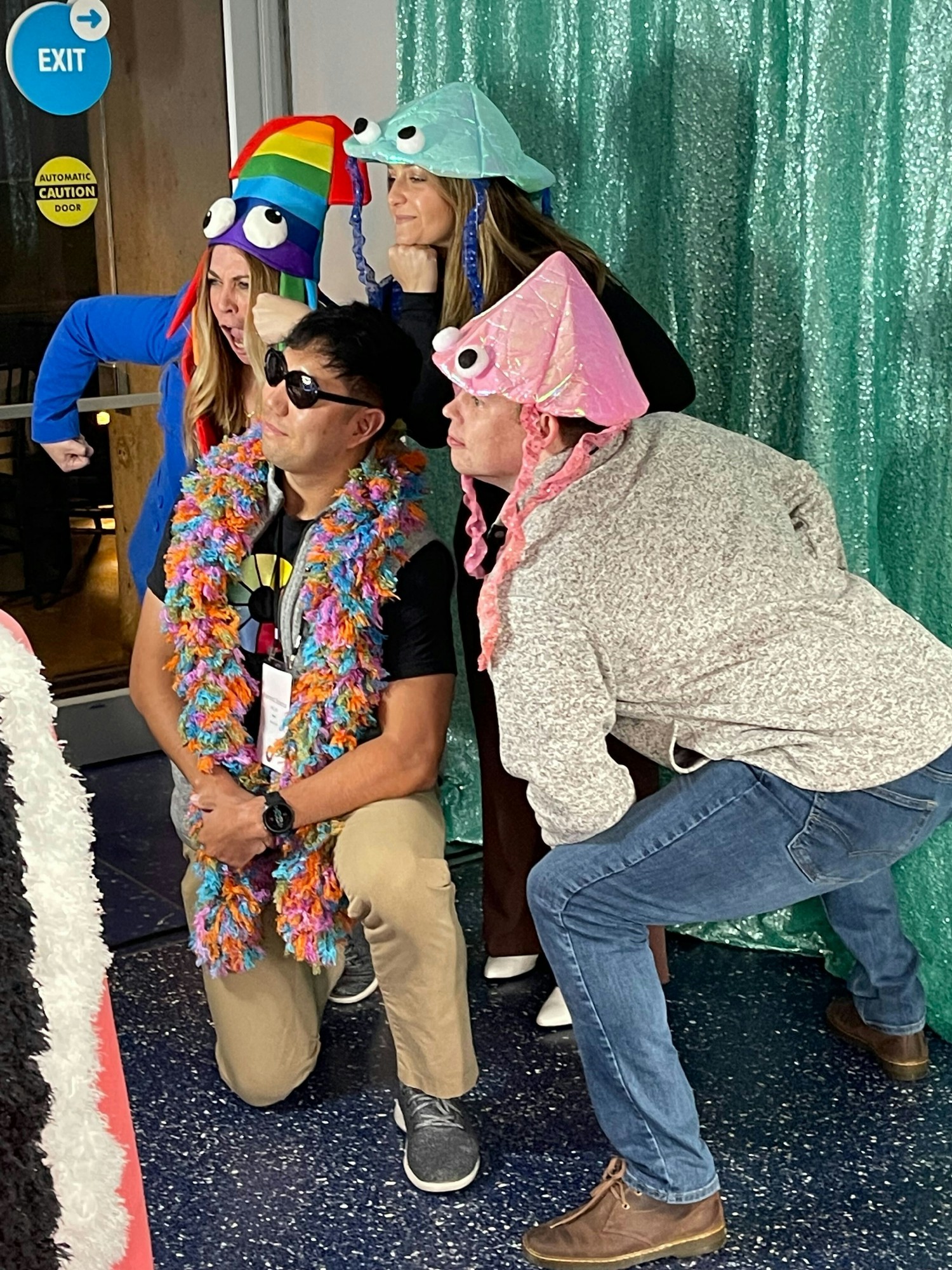 Litmus colleagues having fun in a photo booth at the 2023 All-Staff company retreat