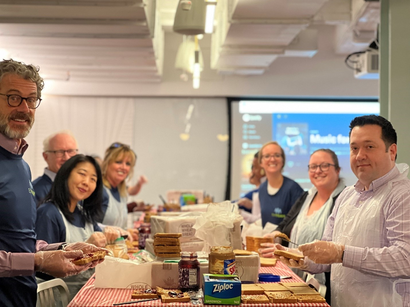 ESRT colleagues volunteer with St. Francis Food Pantry to donate PB&J sandwiches. 