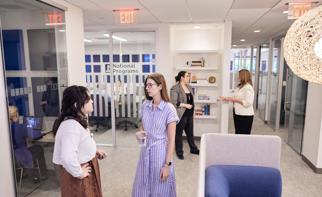 BBB National Programs socialize at the organization’s McLean headquarters