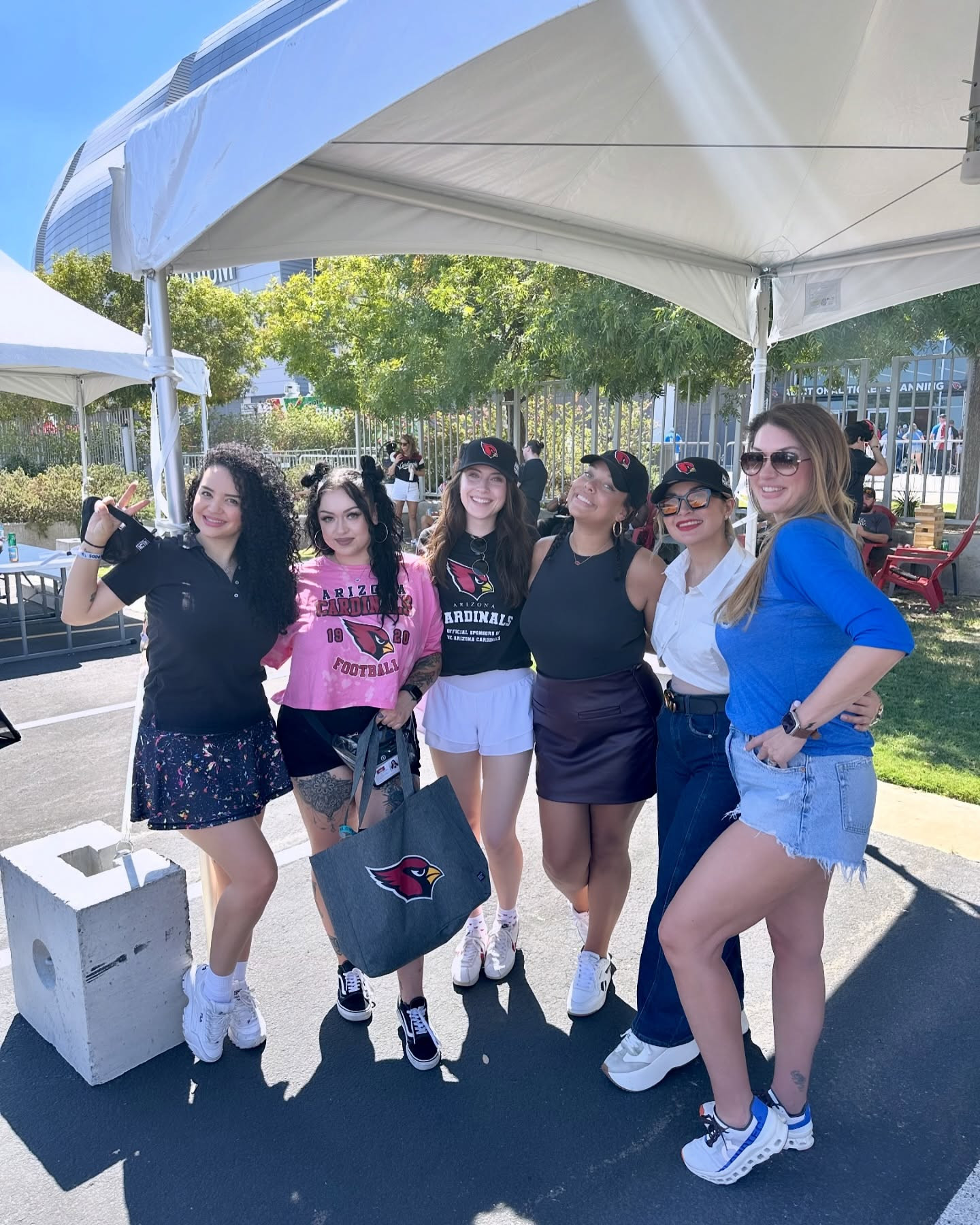 The team enjoying a Cardinal's football game alongside clients and friends! 