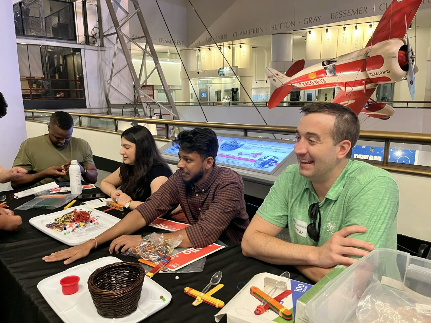 Osanians volunteering at the Museum of Science + Industry in Chicago during our 2024 Team Trip 