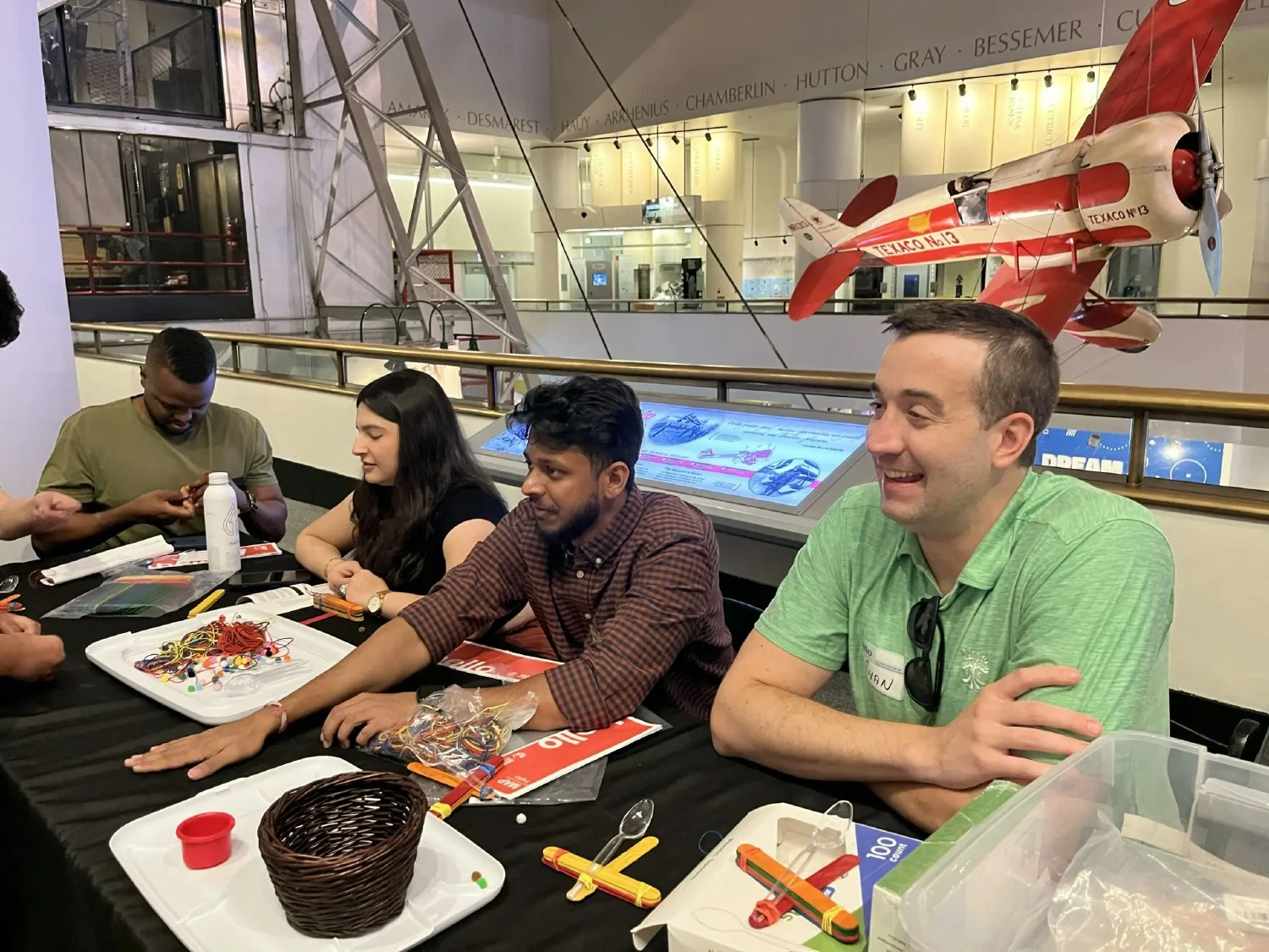Osanians volunteering at the Museum of Science + Industry in Chicago during our 2024 Team Trip 
