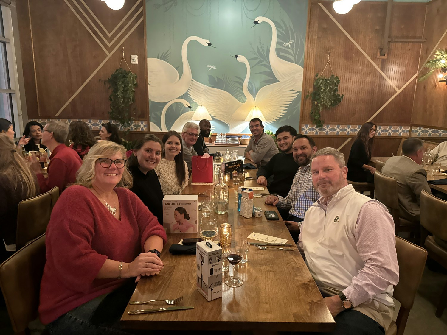 Conti Federal’s Chief Executive Officer Peter Ceribelli, seated with some of our employees at our annual holiday party.