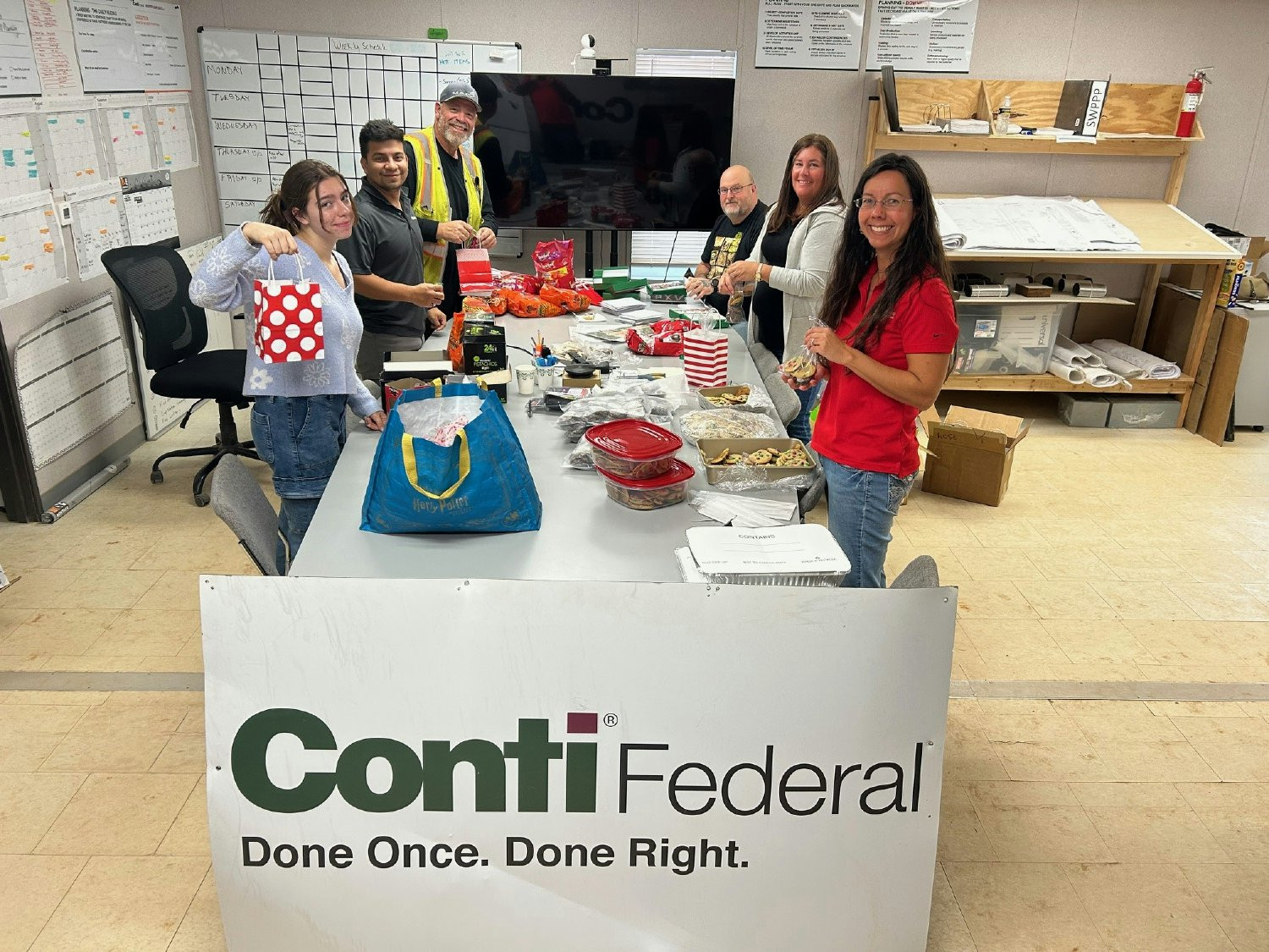 Our team in Hurlburt Field, Florida packed over 100 holiday gift bags for Conti Federal's trade workers.