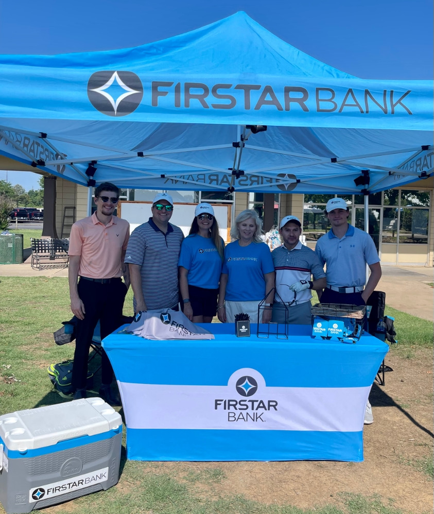 Firstar Bank employees celebrate being voted Best Bank in Muskogee, OK.