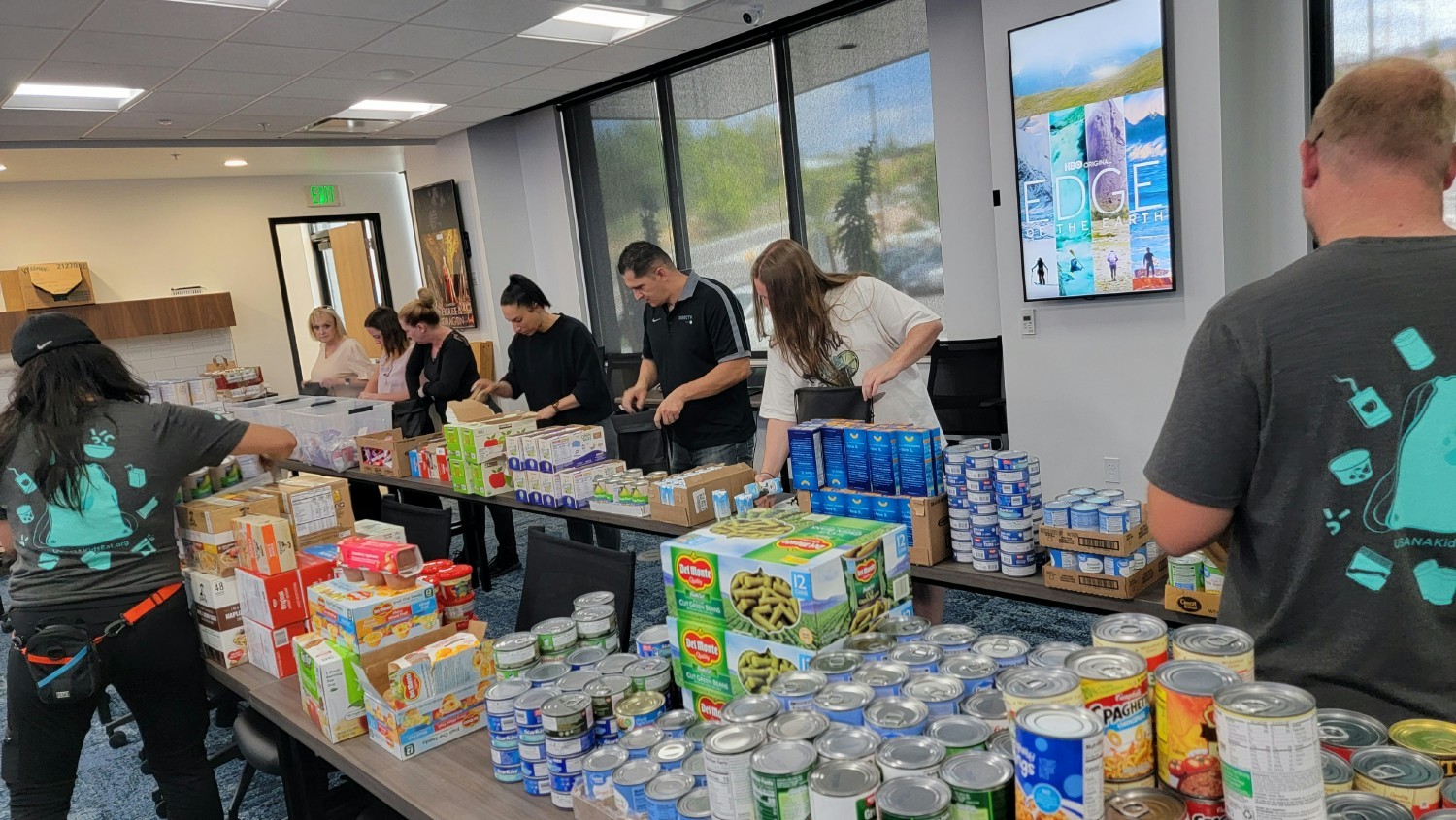 Together with USANA Kids Eats, Groove employees donated and package over 3500 items of food.