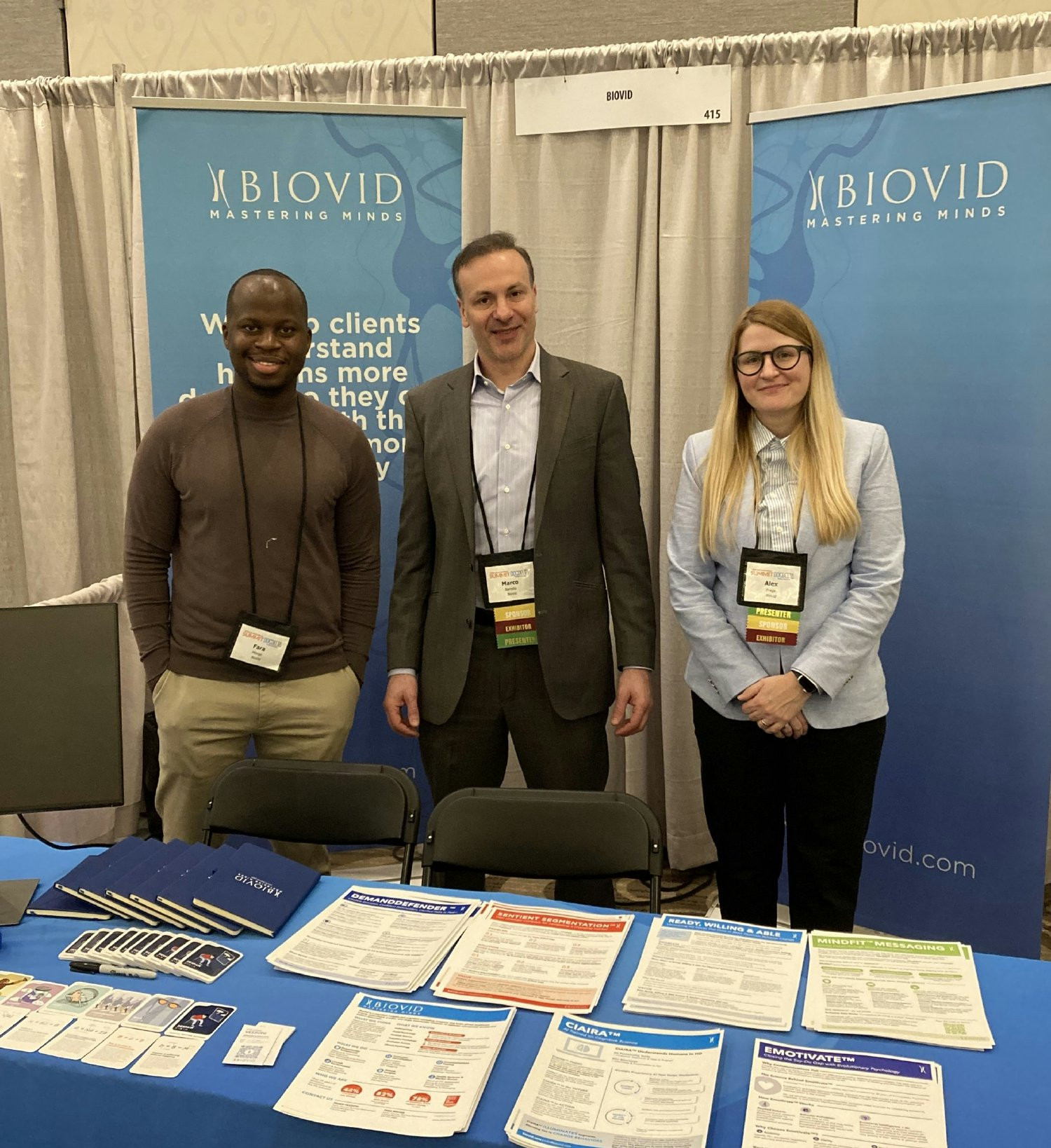 Sharing our knowledge at a conference.