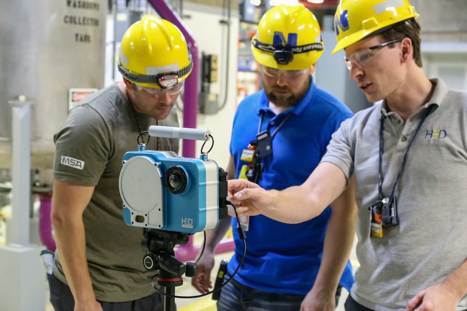 CEO Willy Kaye (right) interacting with customers at a nuclear power plant.  