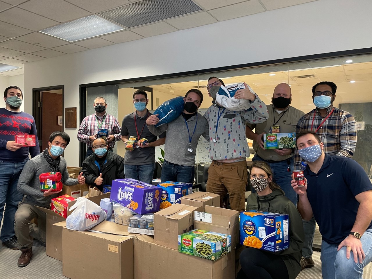 Employees participating in a food drive.  