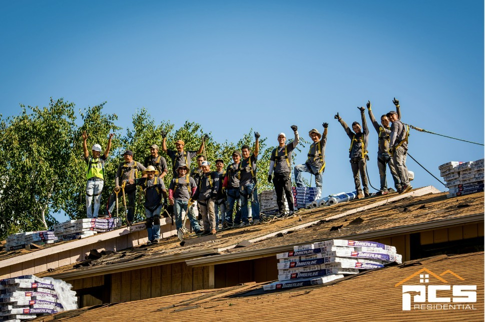 Our crew members restoring a roof.