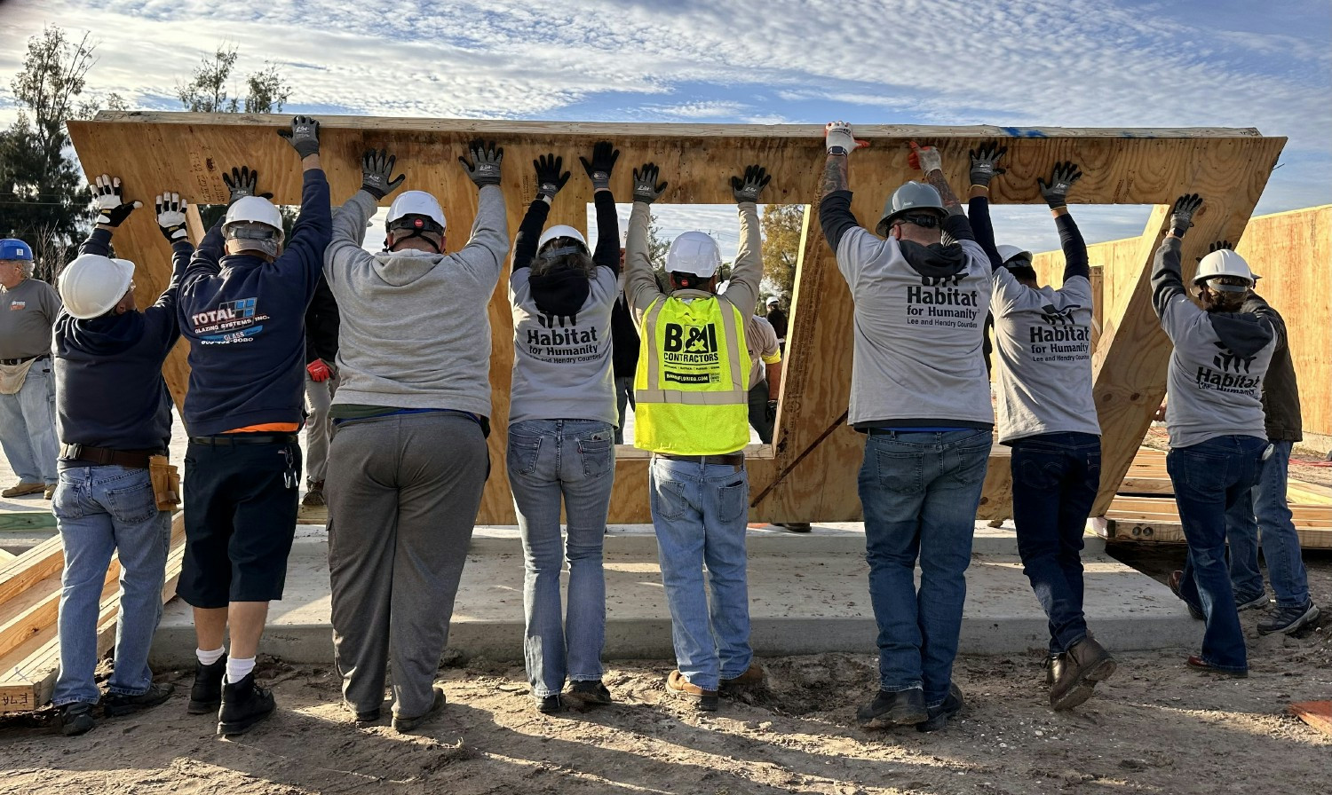 The B&I team members participate in the Wall Raising for Habitat for Humanity each year.