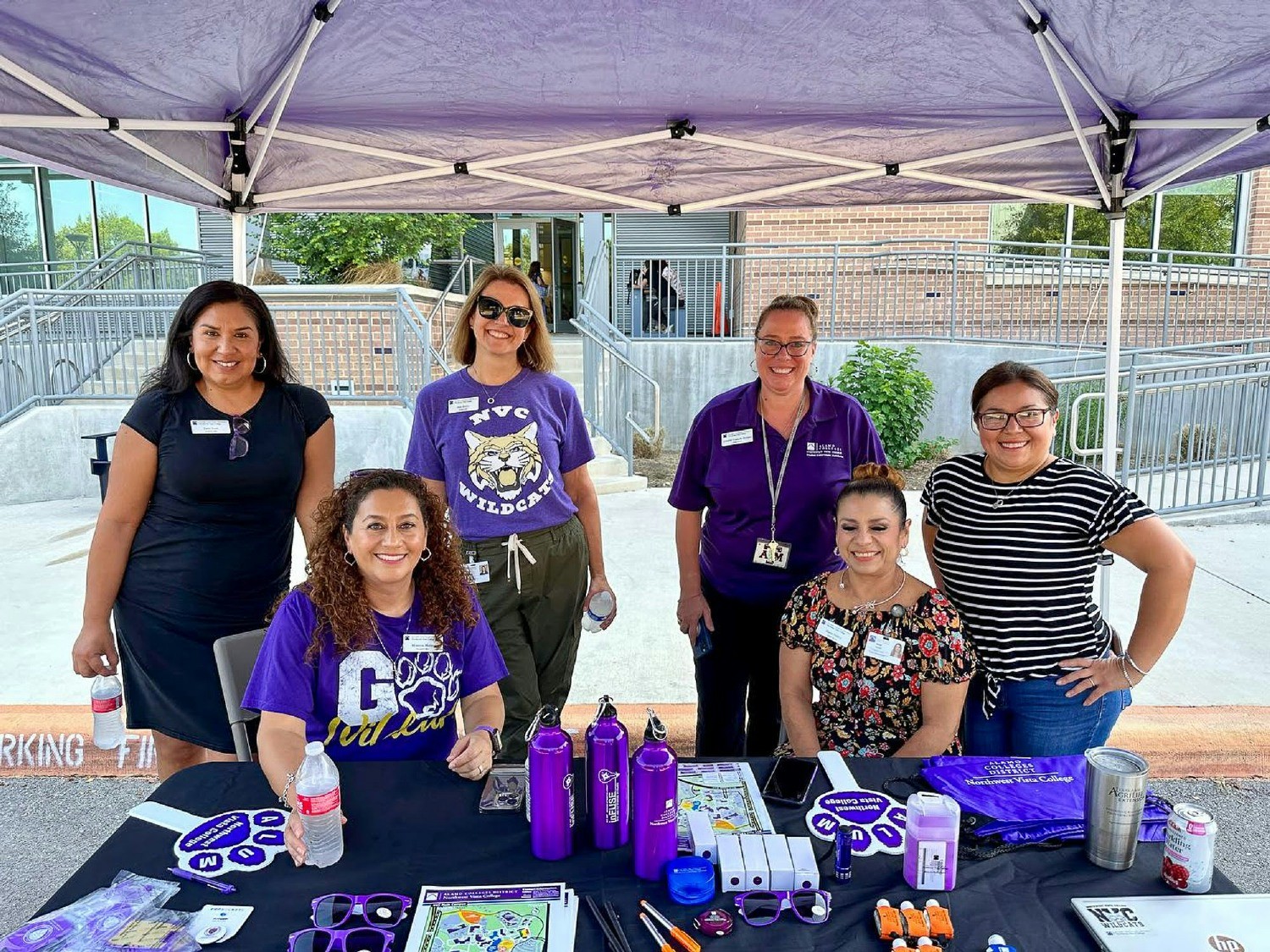 Northwest Vista College leaders host a welcome booth for students during their first week on campus