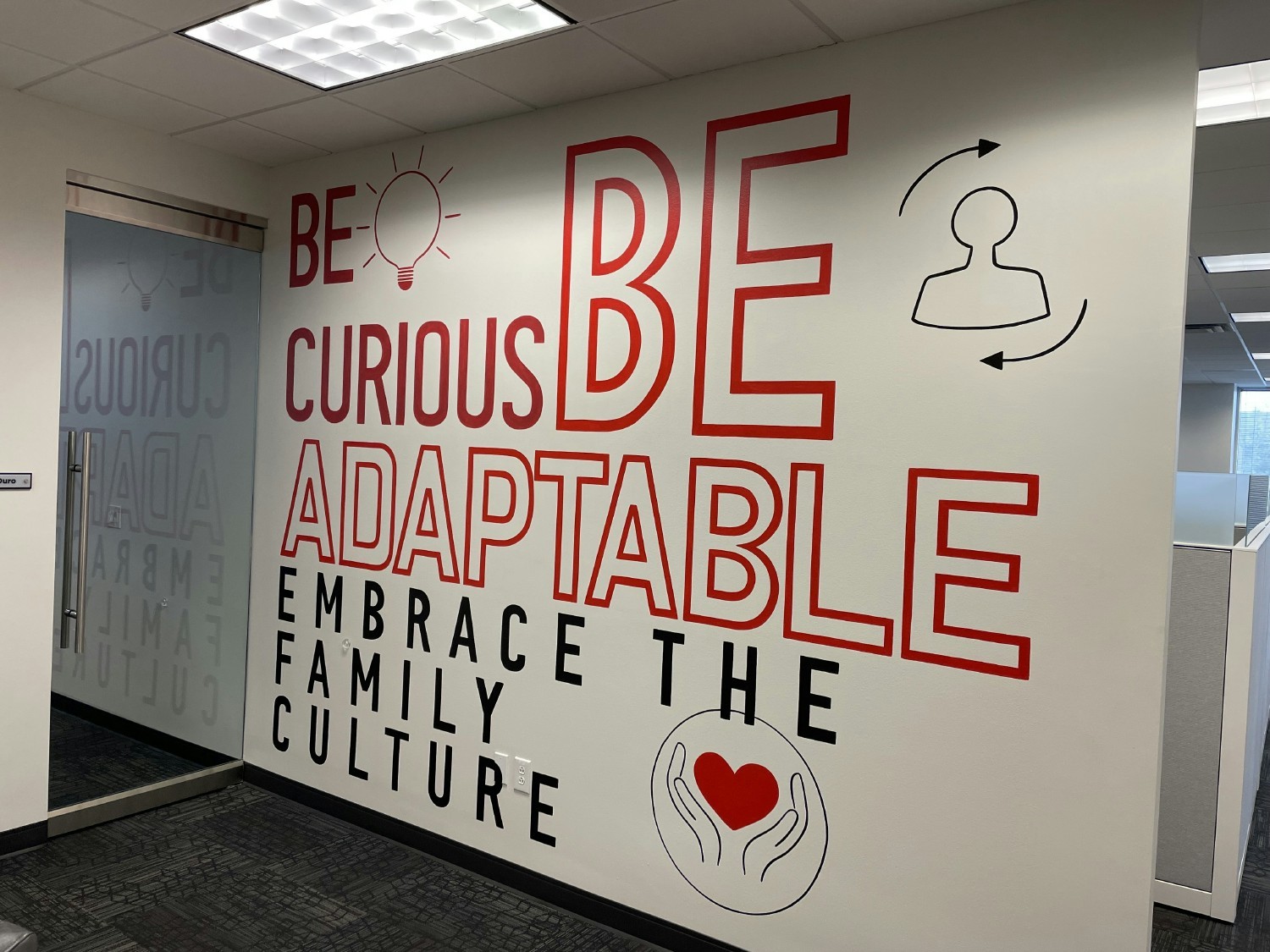 Company core value mural at the entrance to our Plano, TX office. 
