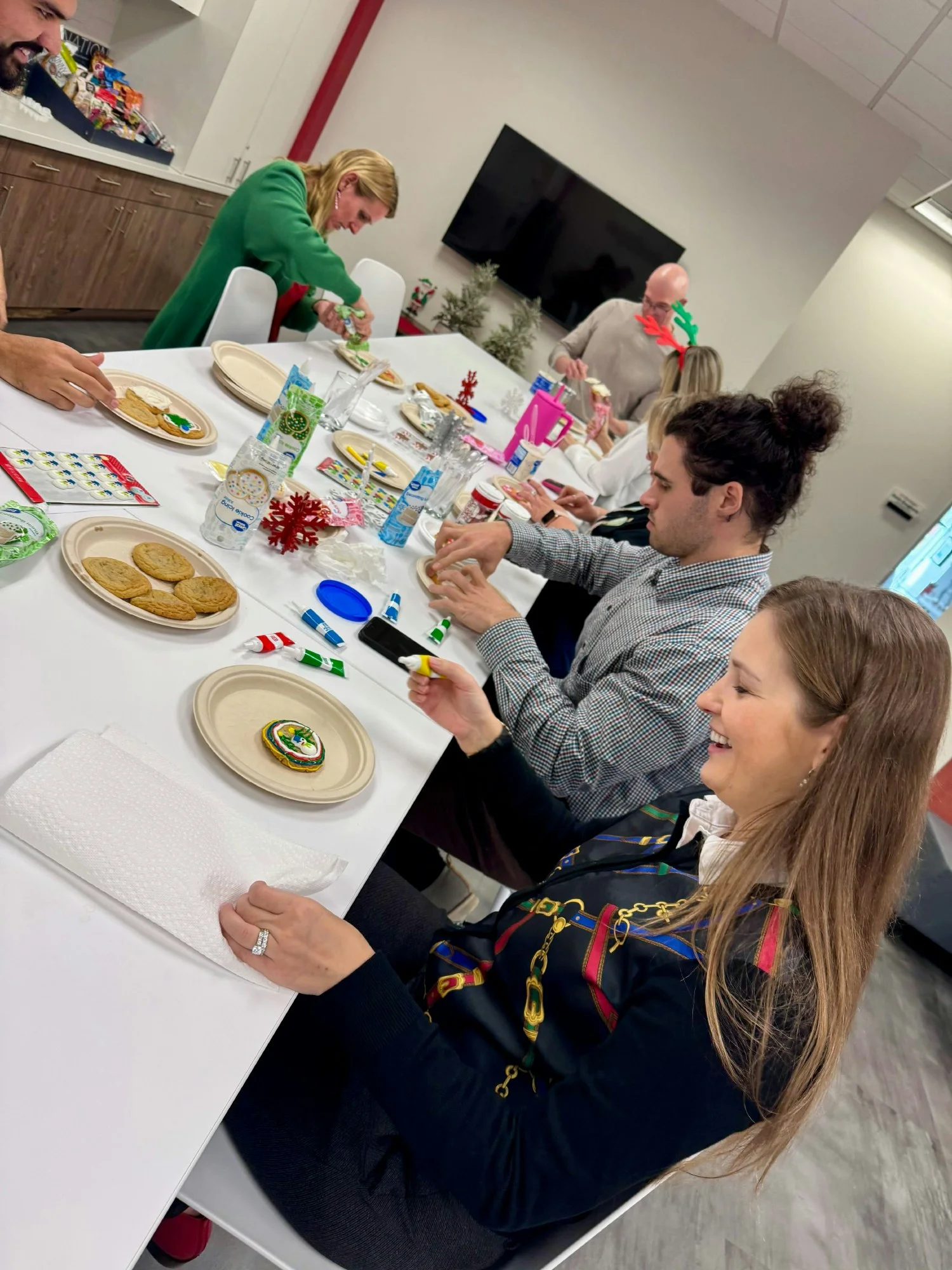 Embracing our #EmbraceFamilyCulture core value with festive cookie decorating - sharing laughter and holiday cheer!
