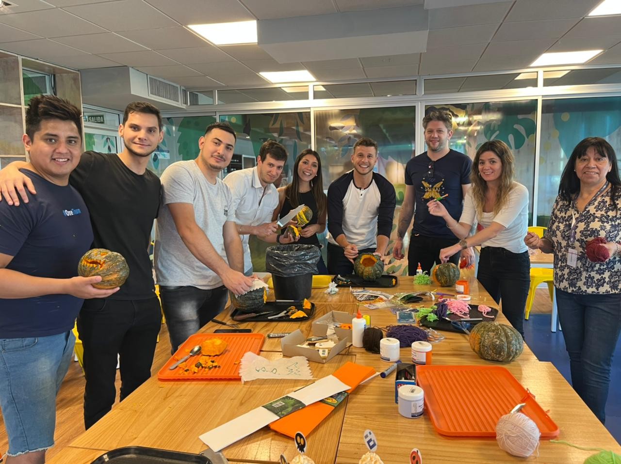 Our Argentina Team carving gourds for our 2022 best pumpkin competition