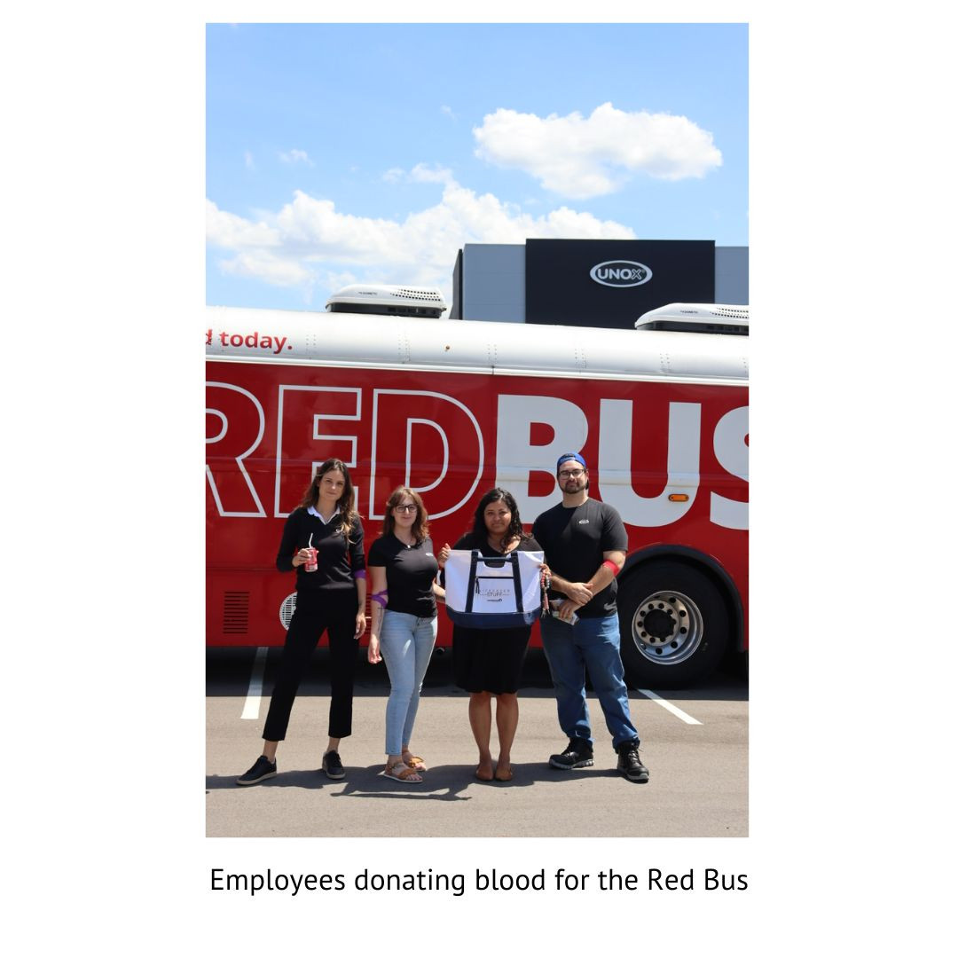Employees Donating Blood for the Red Bus!
