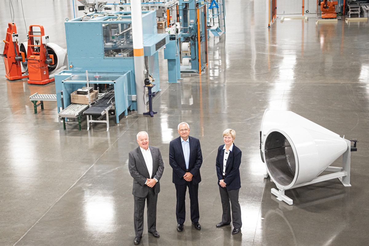 Leadership team in manufacturing facility