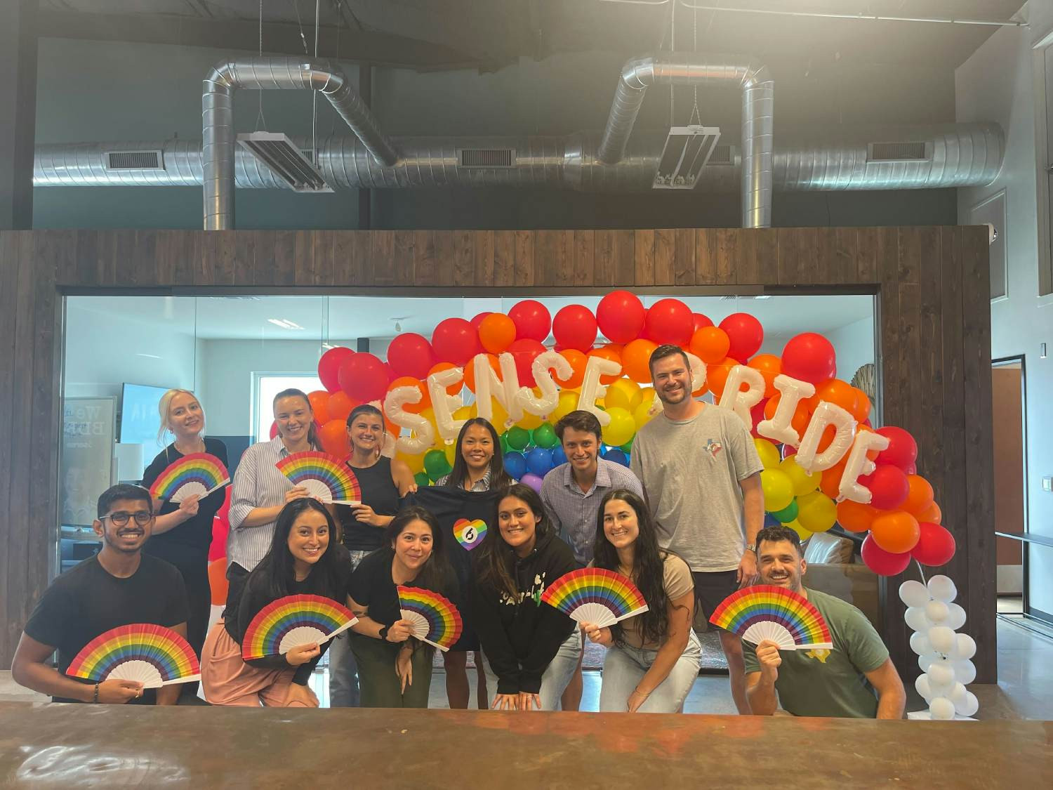 Austin employees celebrating Pride Month at hub day.