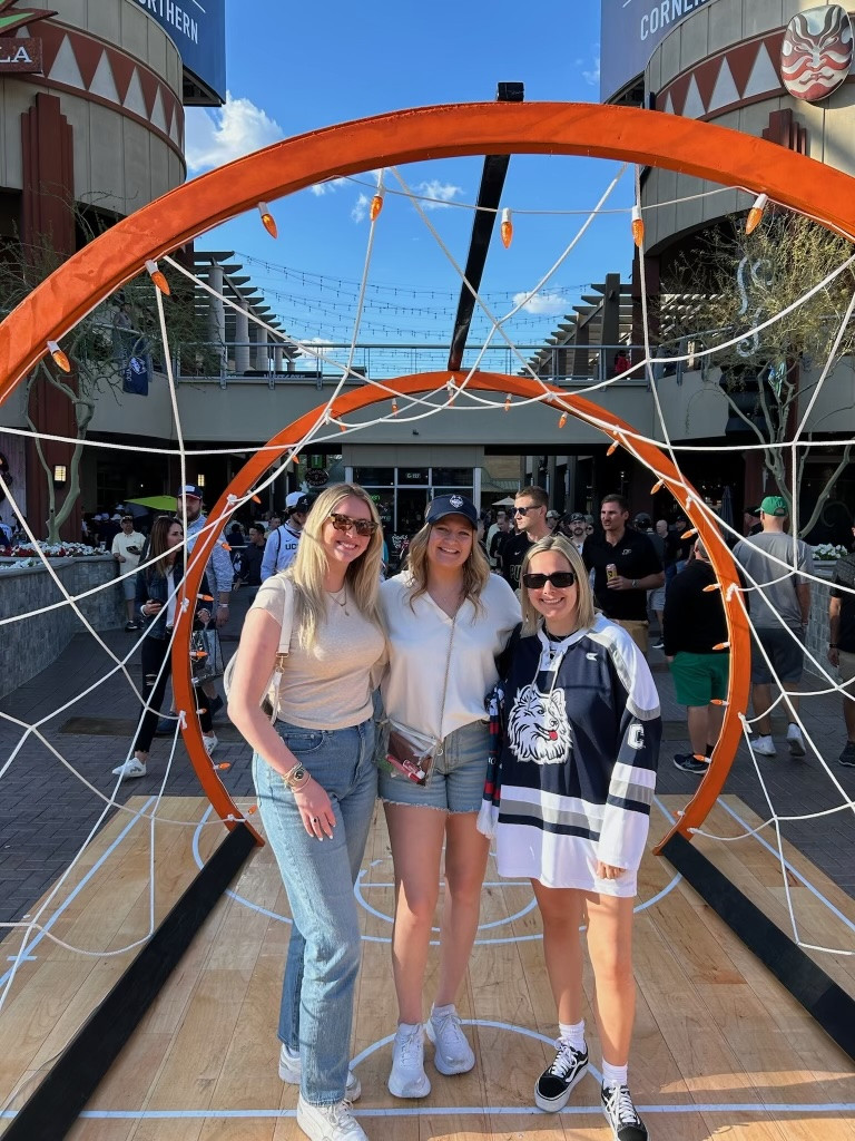TKG colleagues gather outside the office to attend an NCAA Final Four game. 